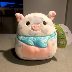 Rosie the pig Squishmallow with bandana.